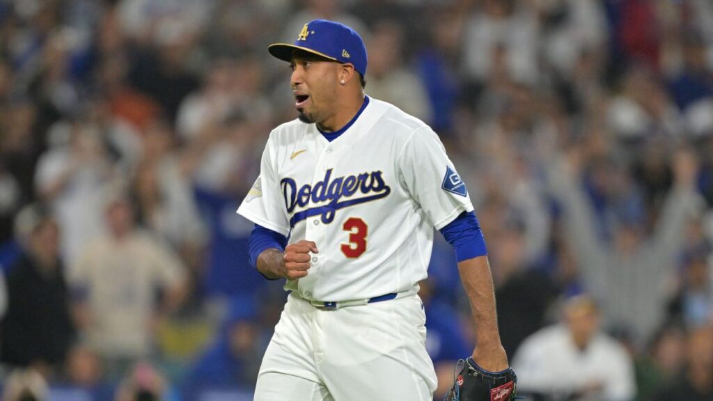 Diaz thrills Dodger Stadium with trumpet entrance, first save