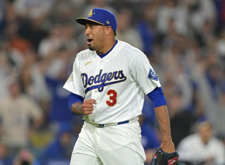 Diaz thrills Dodger Stadium with trumpet entrance, first save