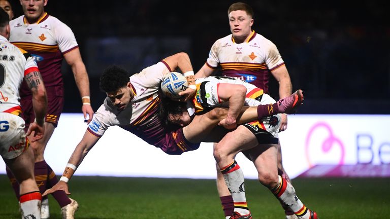 Picture by Olly Hassell/SWpix.com - Huddersfield is tackled by Bradford